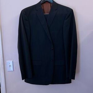 Exterior is blue with a slim green stripe pattern Interior is brown.